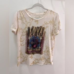 cute t-shirt goes well with a skirt and jeans